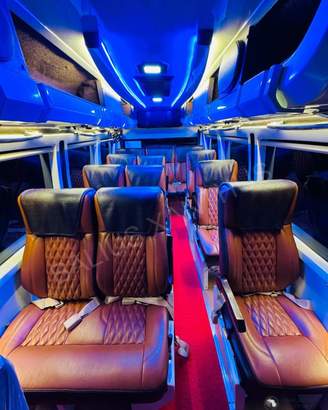 interior view of Deluxe tempo traveller for rent in bangalore with lights and sound system in it