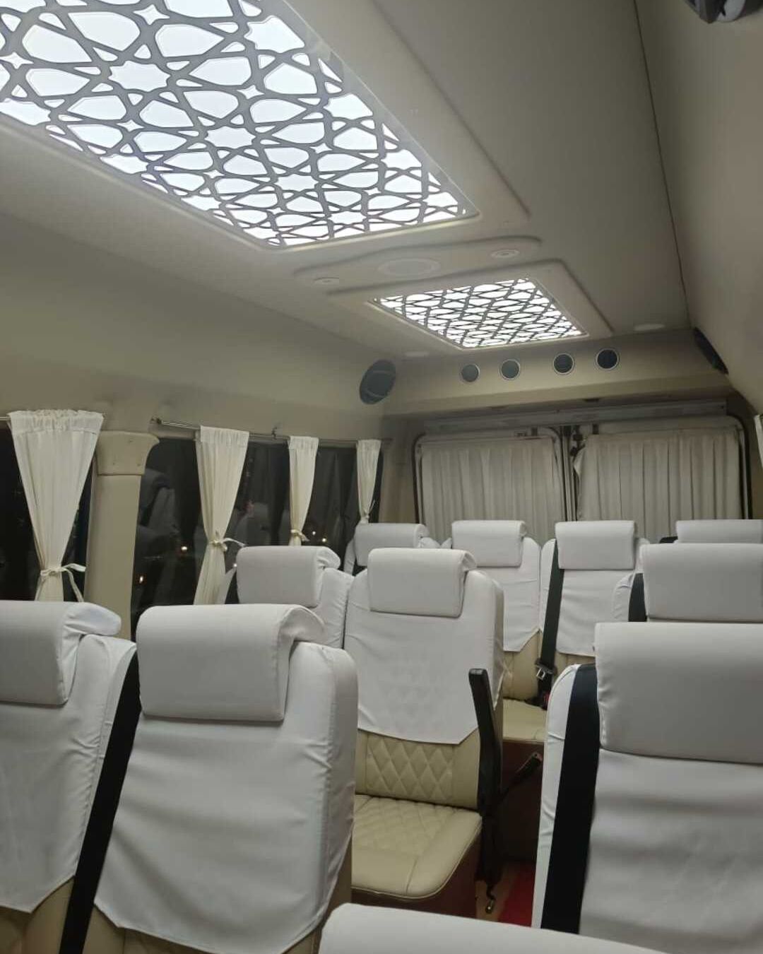 interior view of luxury tempo traveller for rent in bangalore price