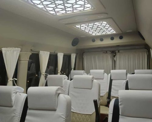 interior view of luxury tempo traveller for rent in bangalore price