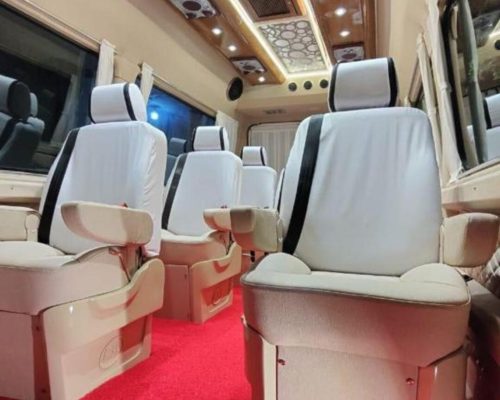 interior view of luxury tempo traveller for rent in bangalore price and near me